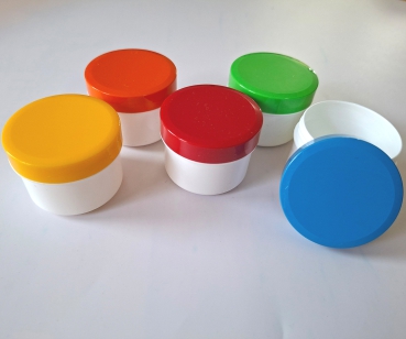 5 Salbendosen mit bunten Deckeln