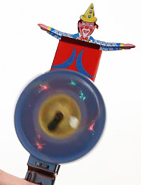Funkelndes Clown-Feuerrad aus Blech  - nostalgisches Sammlerstück