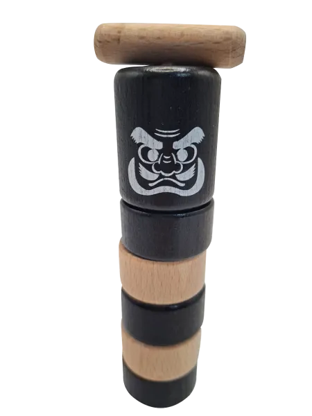 Daruma Otoshi, Spiel zum Thema Trägheit